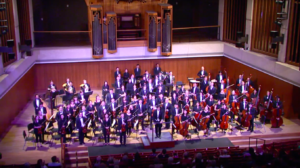 Orchestra performing on stage