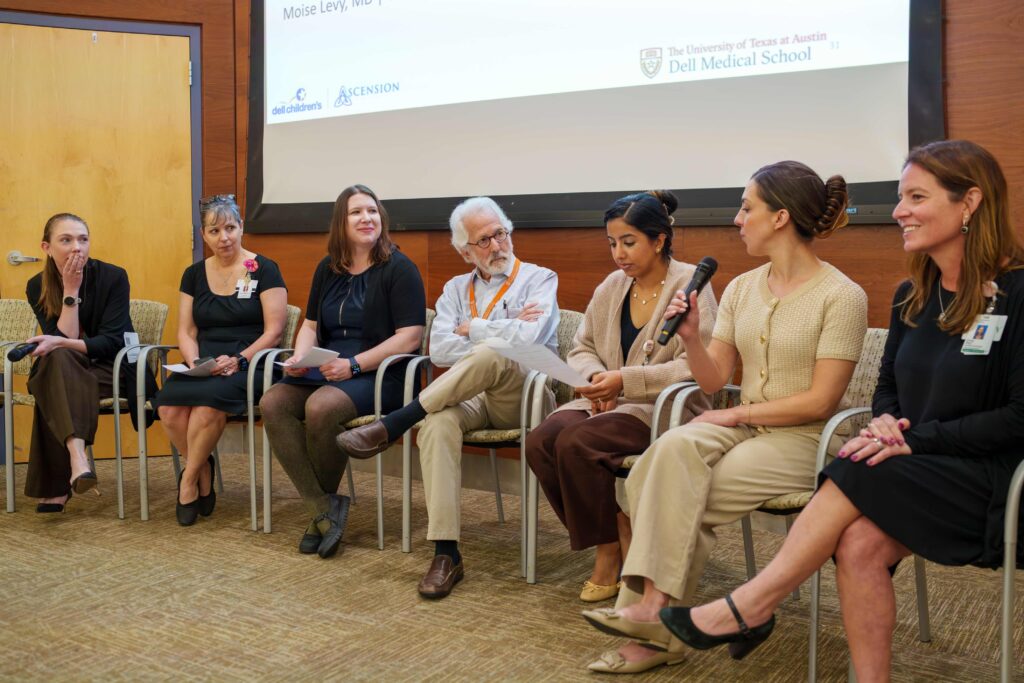 Panelists (L to R) Amy Durand, MD, Virginia Harrod, MD, PhD, Chelsey Ortman, MD, Moise Levy, MD, Neha Puar, MD, Rachel Bridges, PhD, and Emily Greenspahn, PhD answering questions