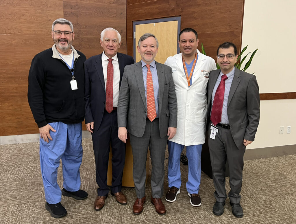 Cormac Maher, MD (middle) with Dell Medical School neurosurgery faculty members (L to R) Juan Ortega-Barnett, MD, Nicholas Barbaro, MD, Kevin Kumar, MD, PhD, and Elias Rizk, MD, PhD, MSc