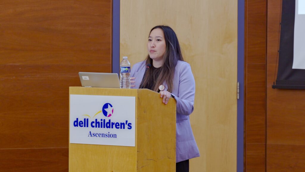 Lori Xu, MD, presenting on pediatric stroke updates