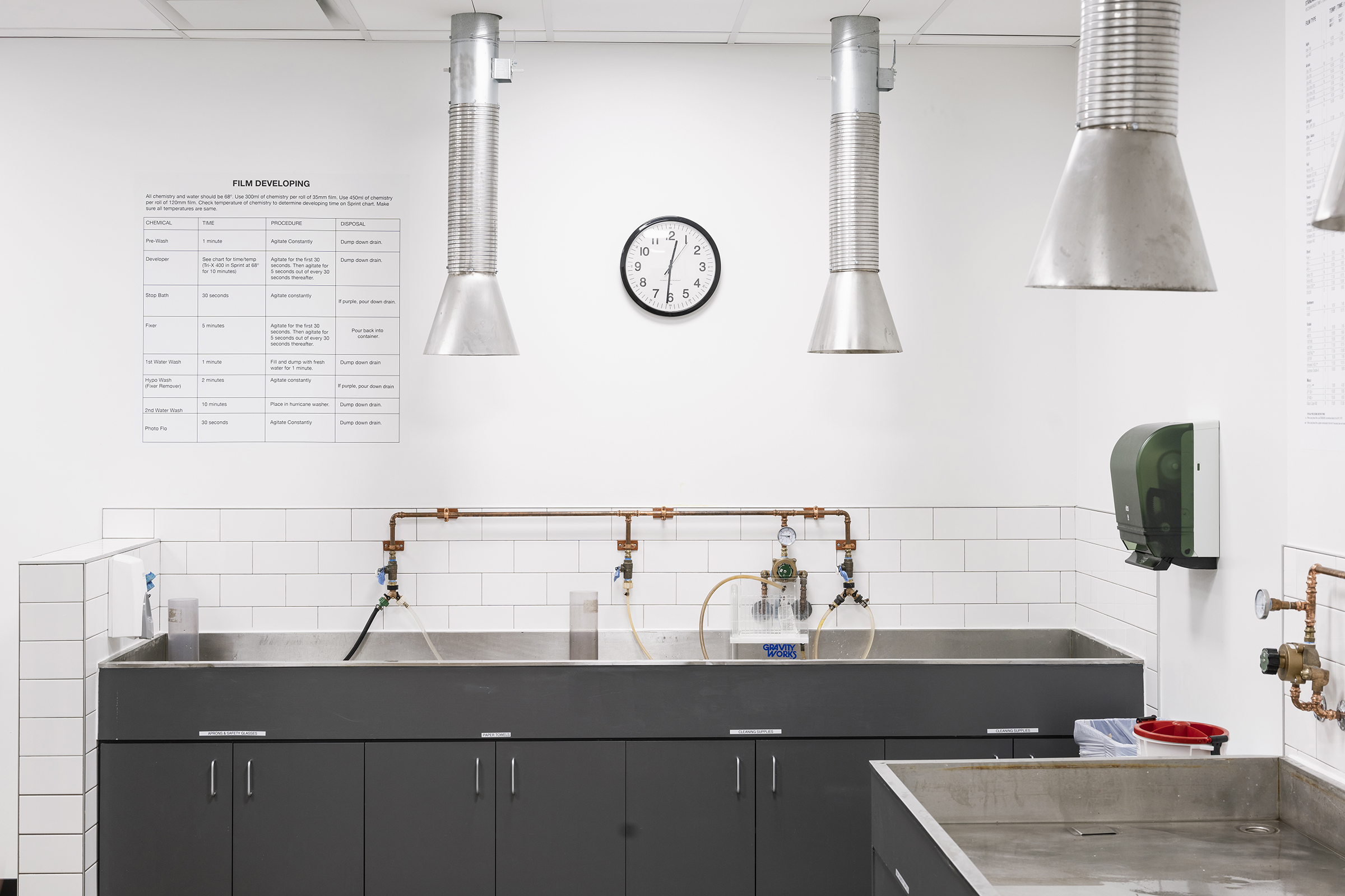 photographic film wet space with developing sinks and exhaust ducts