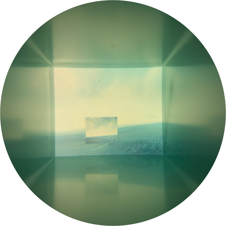 circular image on white background that shows some image with a rectangle