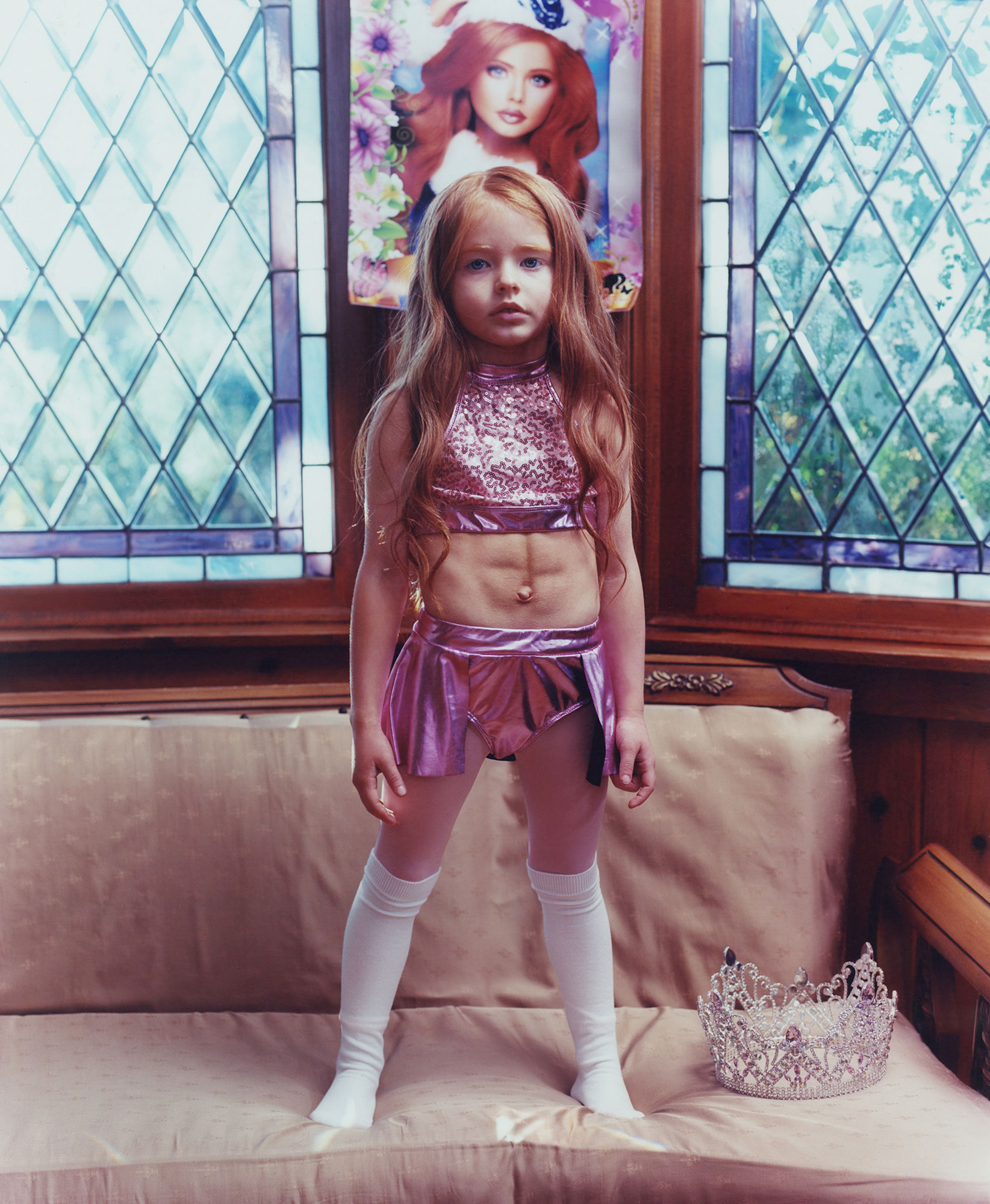 child standing on couch