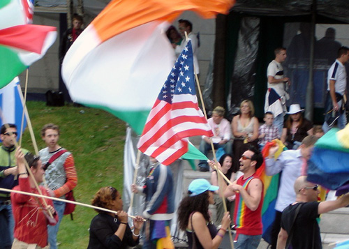 Queer protesters wave their flags in Dublin, Ireland