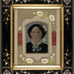 Woman with Rose in Hair. Unidentified photographer. Ca. 1885. Oil on tintype. Ebonized gilt Eastlake style frame with a painted mat and ruffled cloth inserts.