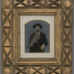 Country Violinist. Unidentified photographer. Ca. 1880. Oil on tintype. Tramp Art style frame.