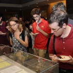 Guests view a display of materials from the Wallace archive at the reception. The materials will be on display through October 17.