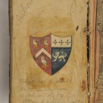 Inside front cover of the Bible, showing the arms of the Derbyshire Sleigh family on the left half of the shield.