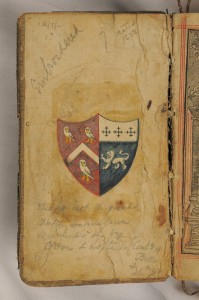 Inside front cover of the Bible, showing the arms of the Derbyshire Sleigh family on the left half of the shield.