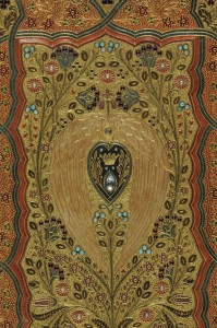 Thomas Moore’s "Lalla Rookh: An Oriental Romance" (London and New York: Routledge, Warne, & Routledge, 1860). This copy of Moore’s "Lalla Rookh" was primped in the early twentieth century. Sangorski and Sutcliffe of London bound this weighty three-pound copy in a colored leather binding inlaid with gold to form an intricate floral pattern studded with a central diamond and several rubies, pearls, and turquoises. Hidden inside the front cover is a stunning Cosway-style portrait of Moore, similar to Marie Antoinette’s portrait on another book in this display. A floral pattern was chipped into the book’s gilded edges creating a bas-relief effect, not unlike the gauffered edges on the embroidered prayer book mentioned below. Photo by Pete Smith.