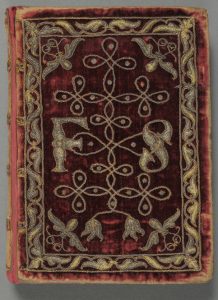 "Book of Common Prayer" (London: Christopher Barker, 1586). Embroidered with silver cord and thread, this rare surviving example of textile binding features red velvet covers decorated with spangles. Although the exact date of this binding is unknown, it closely resembles the embroidered velvet Bible presented by the same printer, Christopher Barker, to Queen Elizabeth I as a New Year’s gift in 1584. The identity of ‘F. S.’ remains a mystery, but the gauffered edges—gilded, and then impressed with patterns by a heated tool—indicate that this book was owned by a member of the upper class. A final clue to the mysterious owner’s status lies in a 1638 statement by a guild of English embroiderers, who claimed that their book covers were fit for the “Nobility and Gentry of this kingdome… and not for common persons.” Photo by Pete Smith.