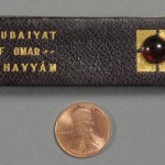 "The Rubáiyát of Omar Khayyám of Naishápúr" (Needham, MA: Rosemary Press, 1916). Miniature Book Collection. This tiny "Rubáiyát," like others in its series, is bound in Russian leather and hand-tooled in gold. It was one of only 60 published by Rosemary Press, founded by Charles Dana Burrage (1857–1926), a Boston lawyer, naturalist, Orientalist, and the first president of the University of California Club of New England. His wee books were given as party favors at club events. Photo by Pete Smith.
