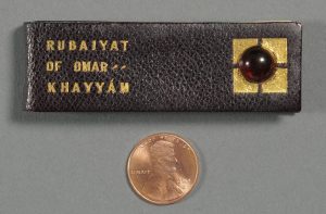 "The Rubáiyát of Omar Khayyám of Naishápúr" (Needham, MA: Rosemary Press, 1916). Miniature Book Collection. This tiny "Rubáiyát," like others in its series, is bound in Russian leather and hand-tooled in gold. It was one of only 60 published by Rosemary Press, founded by Charles Dana Burrage (1857–1926), a Boston lawyer, naturalist, Orientalist, and the first president of the University of California Club of New England. His wee books were given as party favors at club events. Photo by Pete Smith.