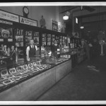 Unidentified Itinerant Photographer, "E. J. Hitt Cigar Co. Store No. 2," 1934. Gelatin silver glass plate negative.