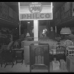 Unidentified Itinerant Photographer, "Satterwhite's furniture store," 1934. Gelatin silver glass plate negative.