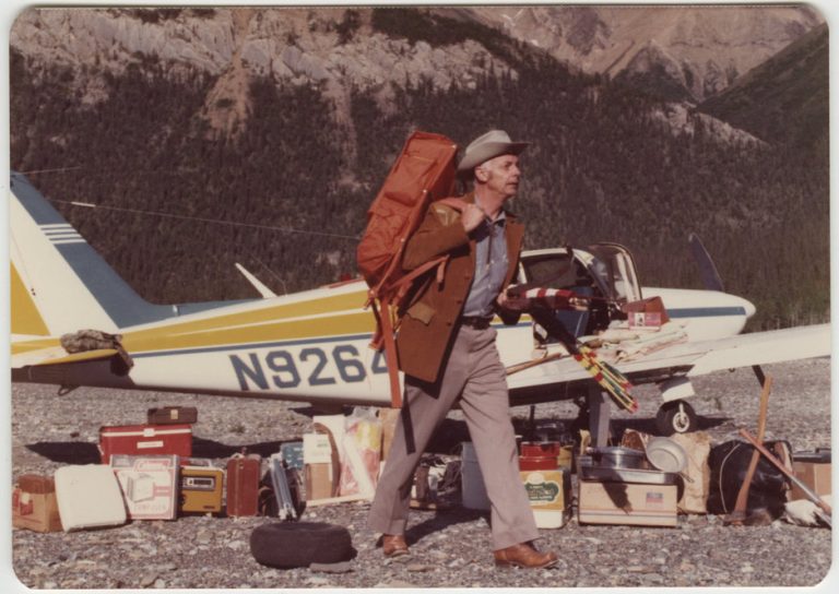 Photo of Walter "Yukon" Yates with his plane in Post River, Alaska, dated July 3, 1975.