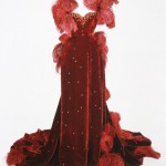 Photo of burgandy ball gown before conservation project.