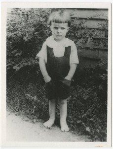 A photograph of Ray Bradbury, age three. Bradbury spent most of his childhood in Waukegan, Illinois, a small community on the western shore of Lake Michigan. Waukegan became the model for the "Green Town" that was the setting for many of his stories. As a boy Bradbury enjoyed fairy tales, horror movies, traveling carnivals, and visiting the local public library, and aspects of each of these interests would influence his later books and characters. Alfred A. Knopf collection.