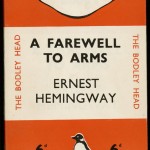 "A Farewell to Arms" by Ernest Hemingway. 1935. This edition of "A Farewell to Arms" was part of the initial ten-book print run of Penguin’s launch in 1935. Other titles in the series included Agatha Christie’s "The Mysterious Affair at Styles" and Dorothy Sayers’s "The Unpleasantness at the Bellona Club." As you can see from this cover, Penguin paperbacks emphasized the company’s branding rather than the subject or author of the work; the original covers included the trademark drawing of the penguin but only rarely included illustrations pertaining to the book’s content. The covers were color-coded: orange for fiction, green for crime, and blue for non-fiction.