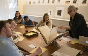 Dr. Sherre L. Paris, a lecturer at The University of Texas at Austin's School of Journalism, teaches the undergraduate class “A Cultural History of Photography” at the Ransom Center. Photo by Pete Smith.
