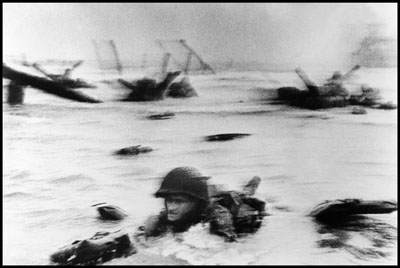 "France. Normandy. Landing of the American troops on Omaha Beach." 1944 © Robert Capa © International Center of Photography/Magnum Photos