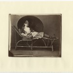 Rev. Charles L. Dodgson. “Xie Kitchin partly in the “Penelope Boothby” dress, on a garden chair, with Japanese sunshade.” 1875–1876.