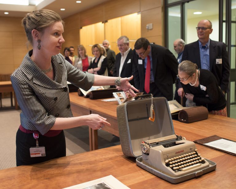 Jean Cannon sharing collection materials, including Anne Sexton’s typewriter, with Ransom Center members.