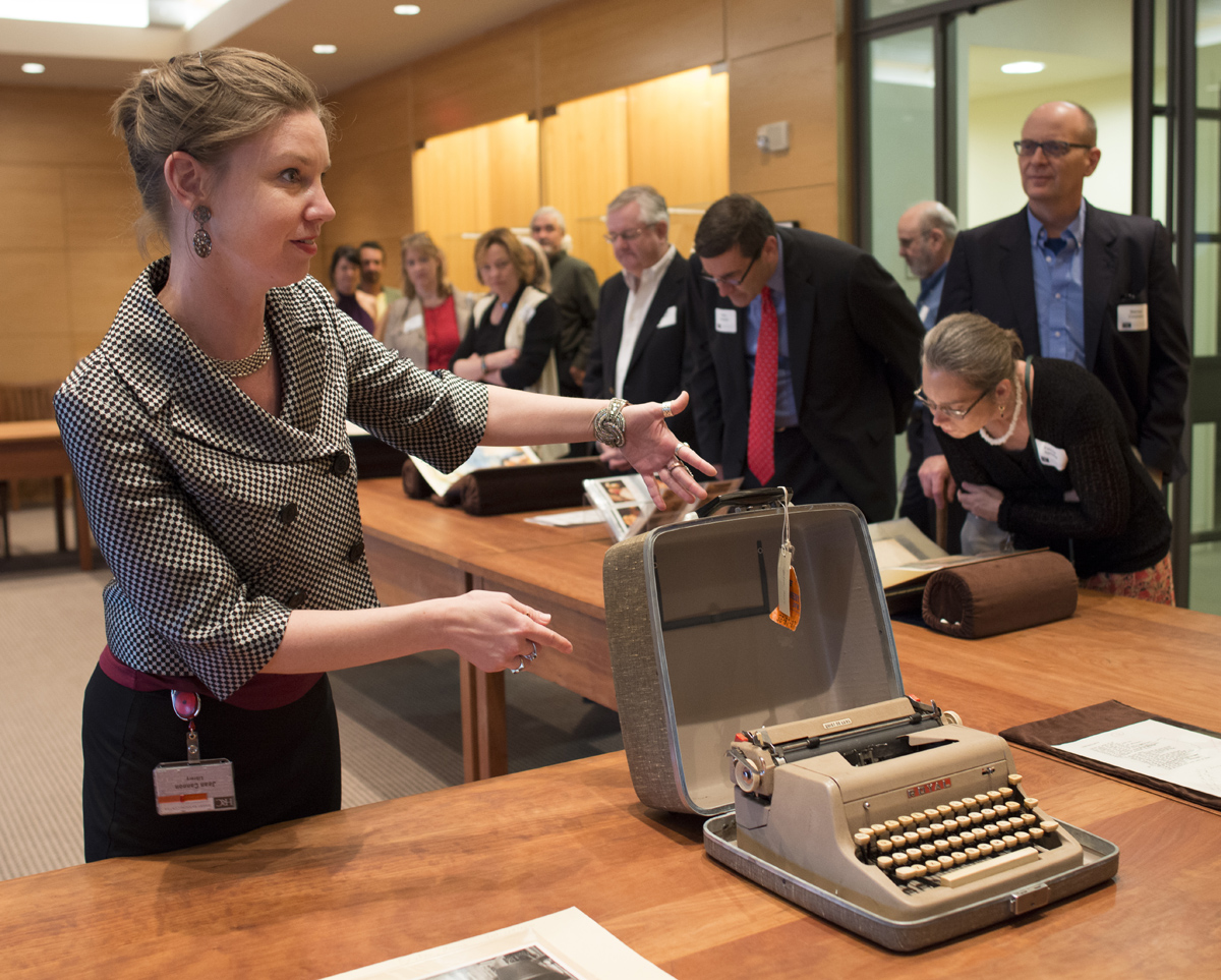 Jean Cannon sharing collection materials, including Anne Sexton’s typewriter, with Ransom Center members.