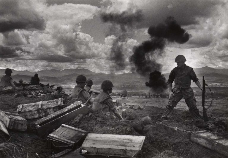 David Douglas Duncan. "From the heights of Con Thien, the U.S. Marines of Mike Company look down upon the DMZ during daily fighter-bomber attacks on the enemy." Vietnam, September/October 1967.