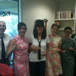 Chelsea Weathers celebrating with fellow Ransom Center interns at her Mad Men themed birthday party. 2012. Unidentified photographer.