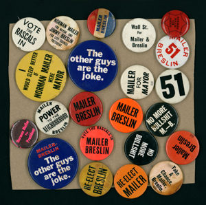 Buttons from Mailer's mayoral campaign.