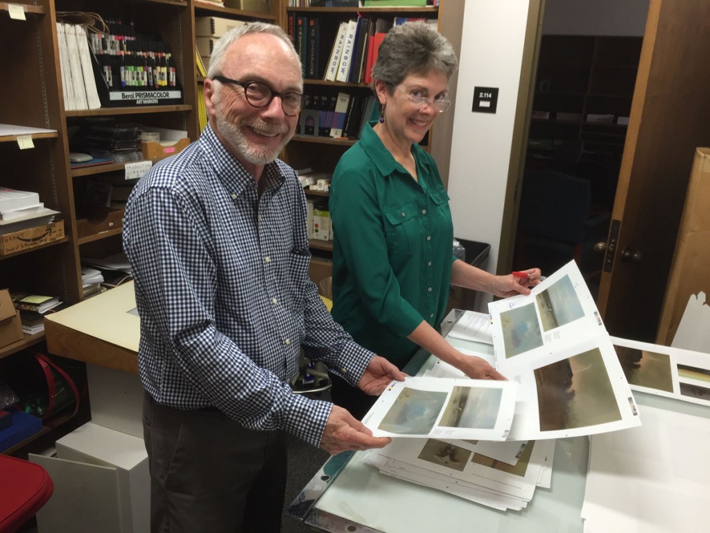 Peter Mears checking color match prints for the Reaugh book, Windows on the West, with Ellen McKie at UT Press.