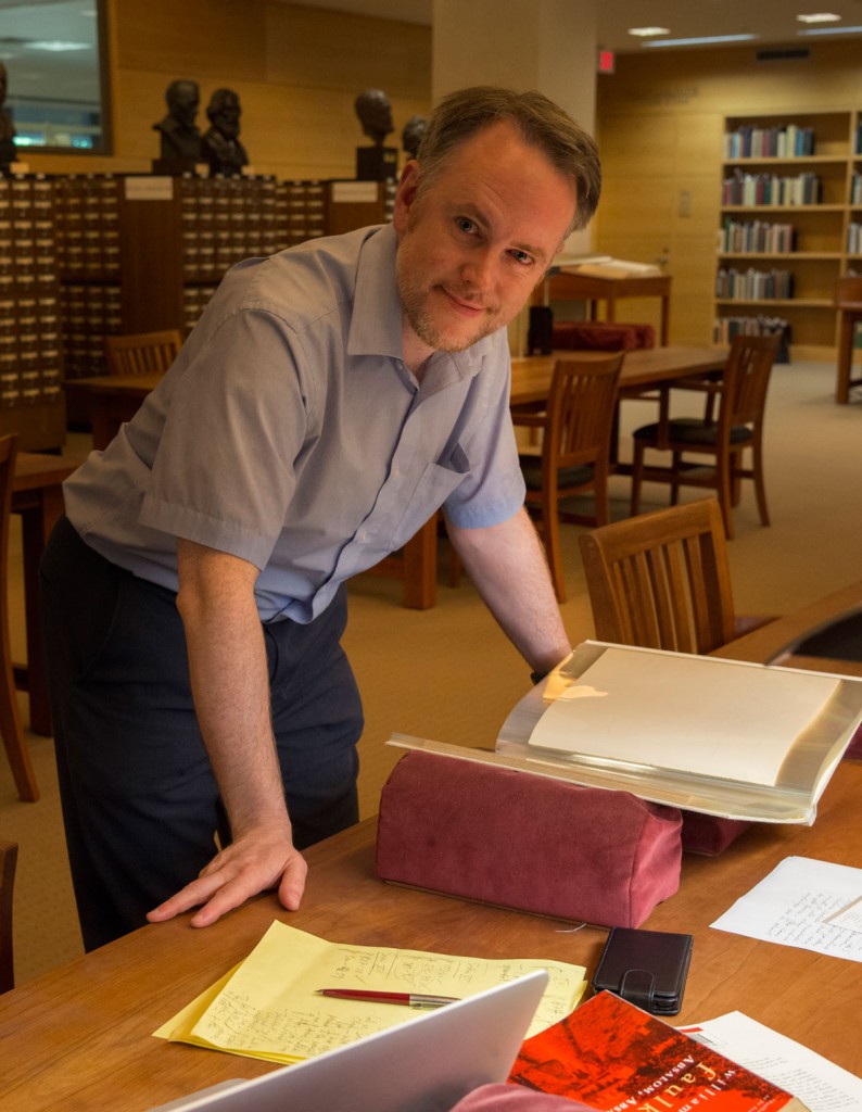 Niall Munro with his research in the Ransom Center's Reading and Viewing Room. Photo by Pete Smith.