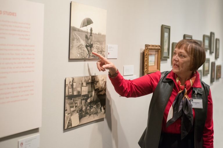 Carol Headrick gives a tour of the exhibition "Frank Reaugh: Landscapes of Texas and the American West." Photo by Pete Smith.
