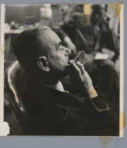 Before treatment - Front with tape residues, and back. Elliott Erwitt (American, b. France 1928), New York, New York [Thomas Mann], 1950. Gelatin silver print, 13.5 x 12.5 cm. Alfred A. Knopf, Inc. Records, Harry Ransom Center. © Elliott Erwitt / Magnum Photos