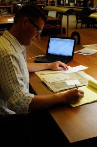 Fellow John Pipkin works with the John Herschel papers in the Reading Room at the Harry Ransom Center. Photo by Anthony Maddaloni.