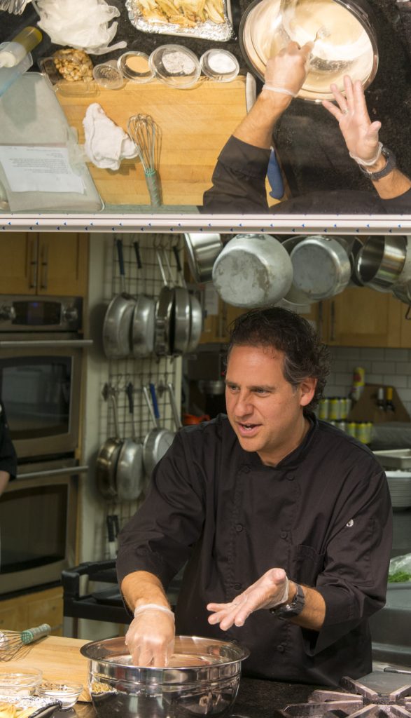 Louis Ortiz demonstrates how to make spatzel, which accompanied the Hungarian goulash.