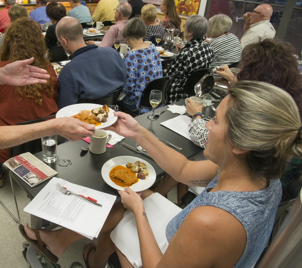 Attendees enjoy the first course.