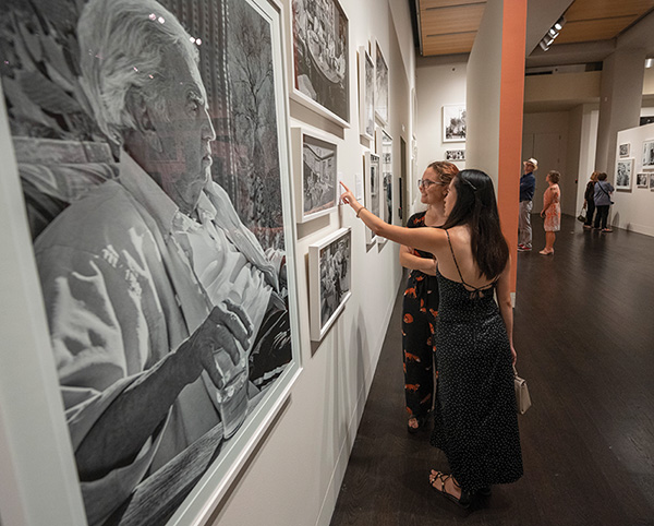 Visitors in exhibition gallery