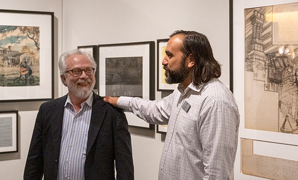 Monte Monreal guiding an exhibition tour