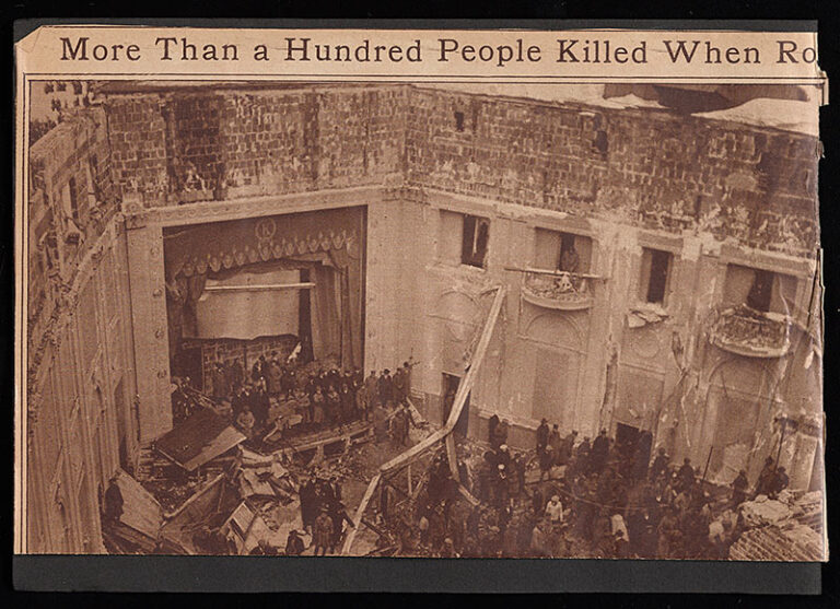 Newspaper headline and photograph of a collapsed building