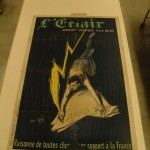 The treated poster is left to dry.