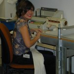 Volunteer Lindsay Barras at the sewing machine. Other volunteers who contributed their help were Katie Andusko, Katy David, Darby Hillman, and Whitney Hughes. Photo by Mary Baughman.