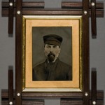 Man in Work Hat. Unidentified photographer. Ca. 1880. Oil on tintype. Rural Gothic Revival style frame.