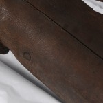 Arthur Conan Doyle's initials are stamped on his golf bag, which is stuffed with tissue paper to maintain its shape.