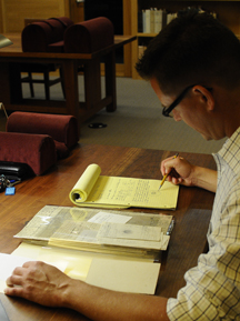 Fellow John Pipkin works with the John Herschel papers in the Reading Room at the Harry Ransom Center.Photo by Anthony Maddaloni. 