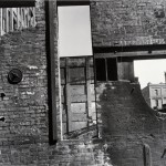 Clarence John Laughlin, "Three Vistas through One Wall," 1937. Gelatin silver print. 26.4 x 36.8 cm. © The Historic New Orleans Collection.