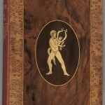 Edward Bulwer-Lytton’s "The Last Days of Pompeii" (London: Collins, ca. 1910s). The Library of Edward Alexander Parsons. Polished wooden inlaid boards cover this otherwise unassuming edition of Lytton’s popular novel, leaving the original spine visible. The inlaid upper cover is composed of at least eight separate pieces of wood, cut and fitted together so precisely that the surface feels completely smooth to the touch. Inlaid bindings peaked in popularity in the seventeenth and eighteenth centuries, so this early twentieth-century repackaging was likely a deliberately anachronistic choice—perhaps a playful reference to the famous mosaics of Pompeii. Photo by Pete Smith.