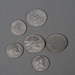 Six silver Greek coins. Photo by Anthony Maddaloni.