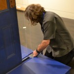 Faulk covers the sliding track with a panel that matches the custom-painted pedestal. The base was designed and fabricated by Faulk.